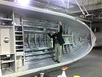 2007 2150 Crestliner Sportfish, 102" beam 
This is friend Jim Knapp of Silver Lake Marine posing in my boat at Little Falls, Minn factory.