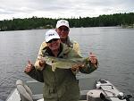 Jen & John:  Jen is the mother of my young fishing buddy "Max".  Met the family @ the International Falls Airport back in 2002 or 2003. Max was 12...