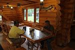 Wallydave and BreezyPoint strategizing over morning coffee where to fish today.