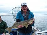My father-in-law with his personal best 27" walleye caught on Leech Lake